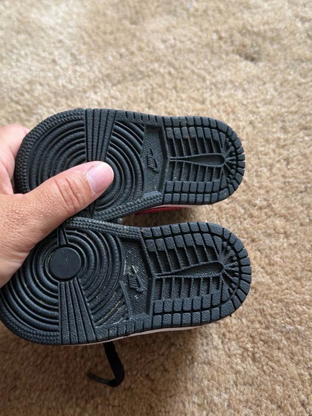 Nike Kids Black Sneakers with Red Swoosh